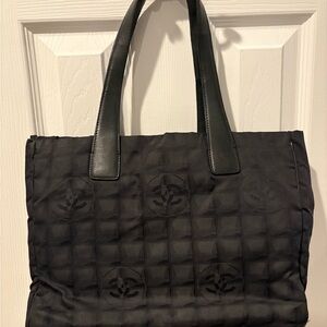 Chanel Travel Line tote bag in black nylon and leather.